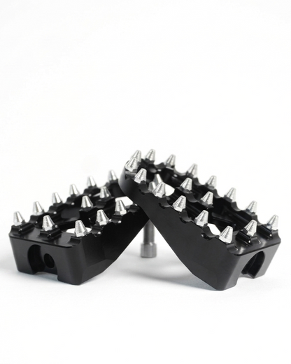 Black foot pegs from the Kaos Customs e-bike pedal delete kit