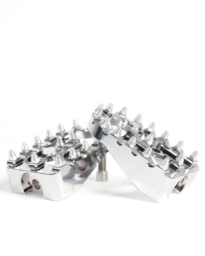 Silver foot pegs from the Kaos Customs e-bike pedal delete kit