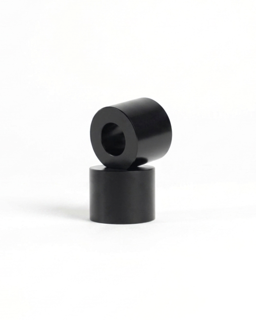 Black model-specific spacers for the e-bike peg kit