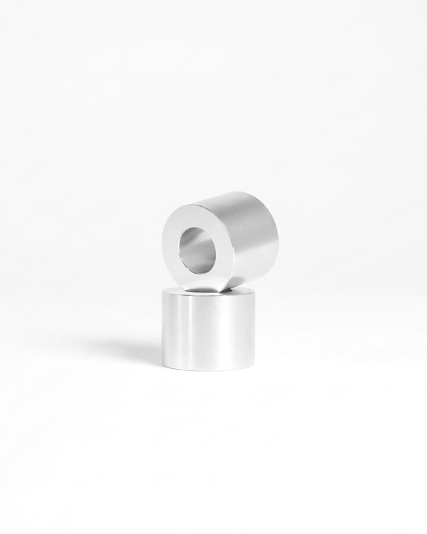 Silver model-specific spacers for the e-bike peg kit